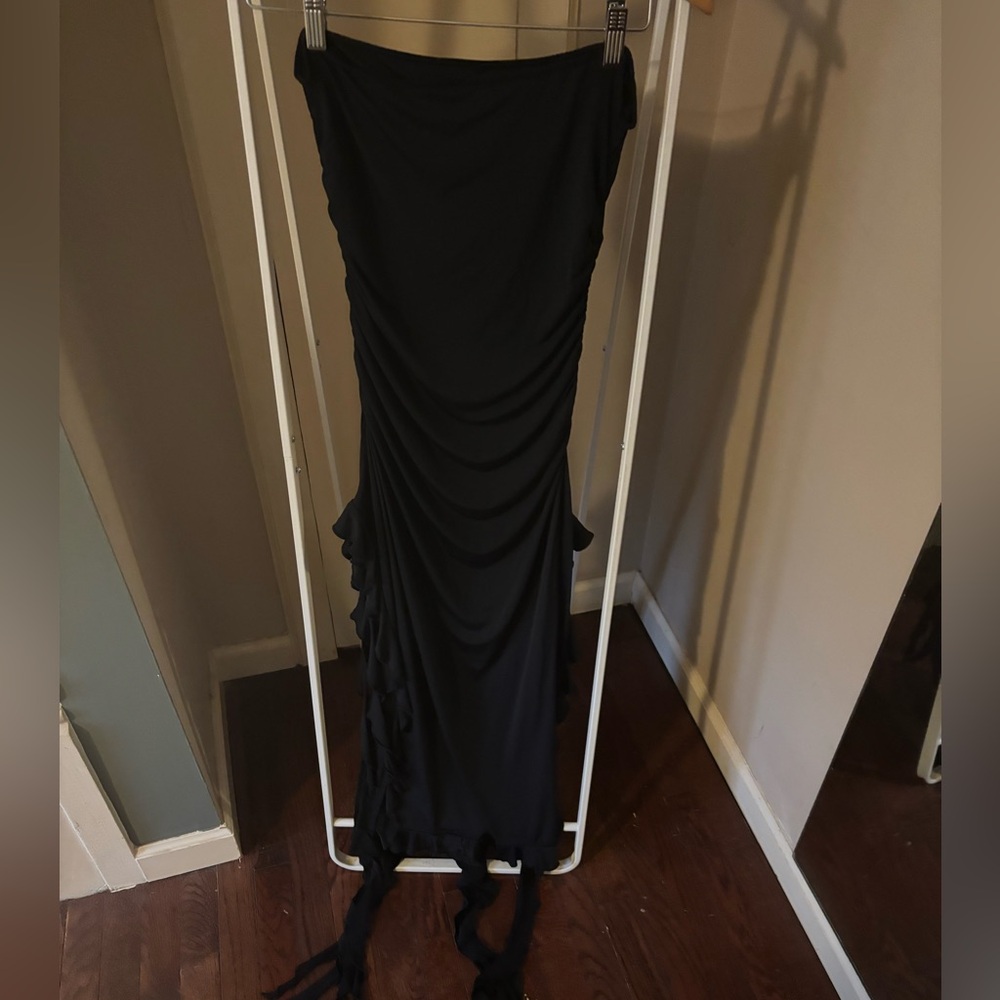 Sexy black mini. Beautiful tassels. Very short if tall. Worn once.